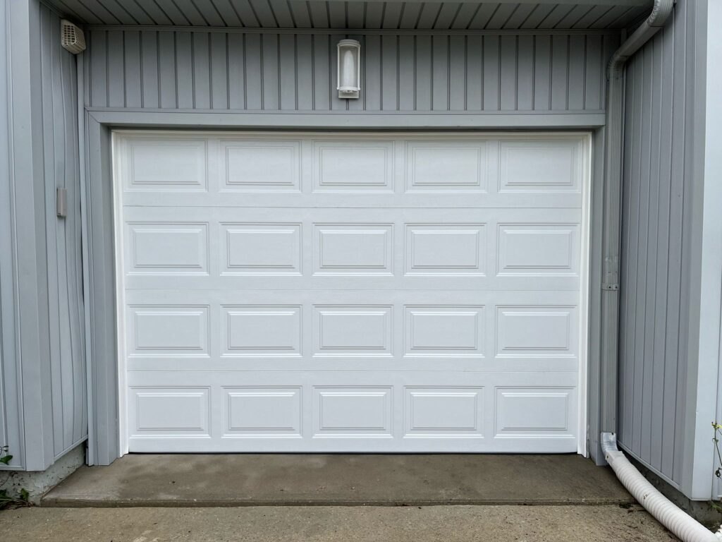 Garage door repair technician at work in Upstate New York